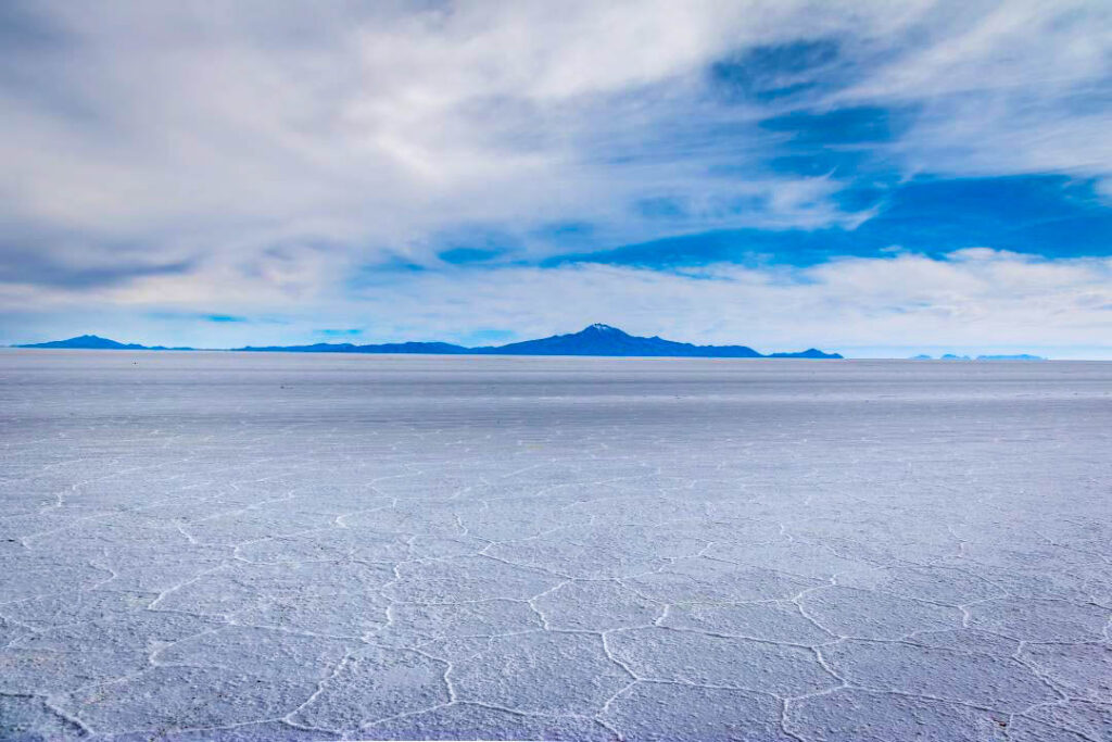 
Salar de Uyuni, Bolivia salt flats, Uyuni, Uyuni salt flats, Bolivian salt flats, world’s largest salt flat, mirror effect, reflection, dry season, wet season, Incahuasi Island, cacti island, salt desert, perspective photography, surreal landscapes, Bolivian travel, adventure travel, stargazing, lithium reserves, solar power, high altitude, altiplano, Eduardo Avaroa park, flamingos, geysers, hot springs, colored lagoons, Salvador Dalí desert, Andean mountains, jeep tour, sunrise, sunset, sky reflection, travel Bolivia,

 Uyuni tours, Uyuni airport, La Paz to Uyuni, Uyuni train cemetery, photography tour, natural wonder, unique landscapes, Andean wildlife, Bolivia tourism, 4x4 tour, mirror landscapes, road trip Bolivia, Potosí, Colchani village, salt hotel, remote locations, bucket list, travel photography, off-the-beaten-path, magical places, South American wonders, nature tourism, Salar de Uyuni facts,

 day trip from Uyuni, best time to visit Uyuni, satellite calibration, ancient coral islands, untouched beauty, tourist attraction, salt extraction, environmental marvel, vast salt plains, desert landscape, otherworldly views, trekking in Bolivia, Uyuni weather, budget travel Bolivia, famous landmarks Bolivia, must-see Bolivia, eco-tourism, natural photography Bolivia, travel influencer Bolivia,

 otherworldly photography, reflection shots, crystal-clear skies, natural formations, Eduardo Avaroa reserve, Bolivia’s unique geography, spectacular natural sites, world wonders, tourist hotspots Bolivia, luxury Bolivia tours, extreme environment Bolivia, Uyuni stargazing tours, salar reflections, flora and fauna Uyuni, Uyuni sunset tours, Bolivian culture, desert photography, remote adventures, Bolivia’s salt wonders, hidden gems Bolivia, Bolivian Andes tours