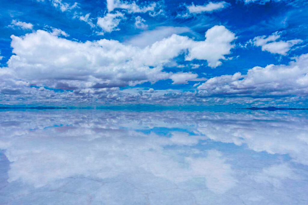 
Salar de Uyuni, Bolivia salt flats, Uyuni, Uyuni salt flats, Bolivian salt flats, world’s largest salt flat, mirror effect, reflection, dry season, wet season, Incahuasi Island, cacti island, salt desert, perspective photography, surreal landscapes, Bolivian travel, adventure travel, stargazing, lithium reserves, solar power, high altitude, altiplano, Eduardo Avaroa park, flamingos, geysers, hot springs, colored lagoons, Salvador Dalí desert, Andean mountains, jeep tour, sunrise, sunset, sky reflection, travel Bolivia,

 Uyuni tours, Uyuni airport, La Paz to Uyuni, Uyuni train cemetery, photography tour, natural wonder, unique landscapes, Andean wildlife, Bolivia tourism, 4x4 tour, mirror landscapes, road trip Bolivia, Potosí, Colchani village, salt hotel, remote locations, bucket list, travel photography, off-the-beaten-path, magical places, South American wonders, nature tourism, Salar de Uyuni facts,

 day trip from Uyuni, best time to visit Uyuni, satellite calibration, ancient coral islands, untouched beauty, tourist attraction, salt extraction, environmental marvel, vast salt plains, desert landscape, otherworldly views, trekking in Bolivia, Uyuni weather, budget travel Bolivia, famous landmarks Bolivia, must-see Bolivia, eco-tourism, natural photography Bolivia, travel influencer Bolivia,

 otherworldly photography, reflection shots, crystal-clear skies, natural formations, Eduardo Avaroa reserve, Bolivia’s unique geography, spectacular natural sites, world wonders, tourist hotspots Bolivia, luxury Bolivia tours, extreme environment Bolivia, Uyuni stargazing tours, salar reflections, flora and fauna Uyuni, Uyuni sunset tours, Bolivian culture, desert photography, remote adventures, Bolivia’s salt wonders, hidden gems Bolivia, Bolivian Andes tours