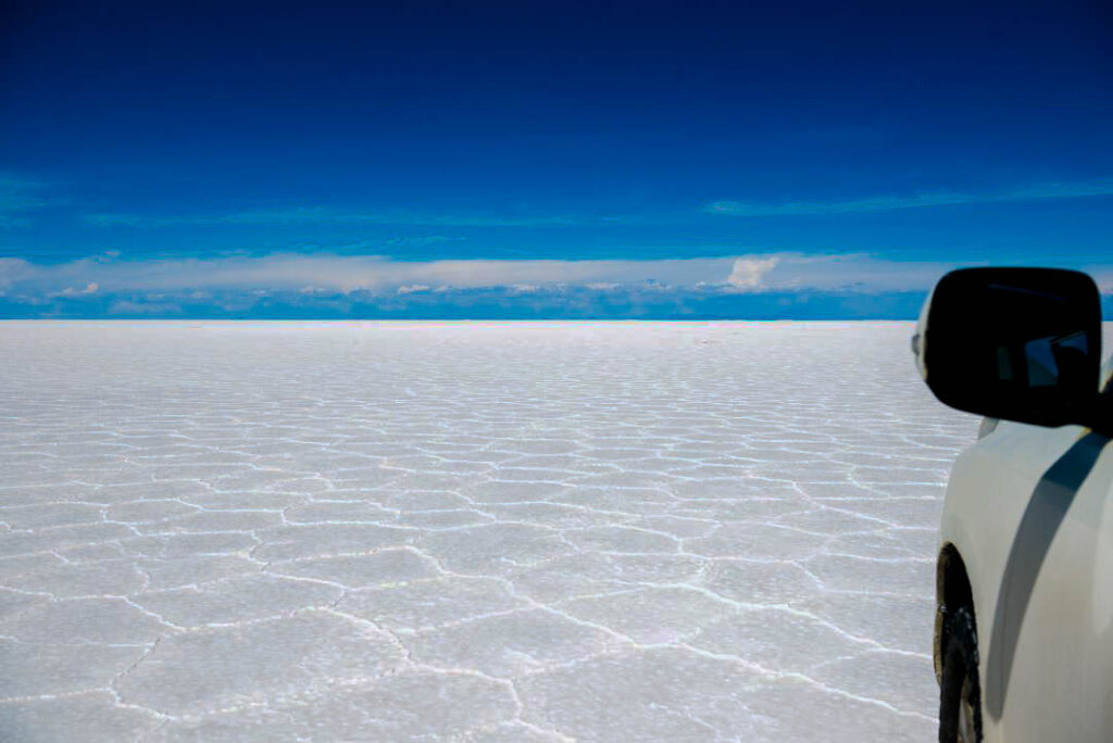 
Salar de Uyuni, Bolivia salt flats, Uyuni, Uyuni salt flats, Bolivian salt flats, world’s largest salt flat, mirror effect, reflection, dry season, wet season, Incahuasi Island, cacti island, salt desert, perspective photography, surreal landscapes, Bolivian travel, adventure travel, stargazing, lithium reserves, solar power, high altitude, altiplano, Eduardo Avaroa park, flamingos, geysers, hot springs, colored lagoons, Salvador Dalí desert, Andean mountains, jeep tour, sunrise, sunset, sky reflection, travel Bolivia,

 Uyuni tours, Uyuni airport, La Paz to Uyuni, Uyuni train cemetery, photography tour, natural wonder, unique landscapes, Andean wildlife, Bolivia tourism, 4x4 tour, mirror landscapes, road trip Bolivia, Potosí, Colchani village, salt hotel, remote locations, bucket list, travel photography, off-the-beaten-path, magical places, South American wonders, nature tourism, Salar de Uyuni facts,

 day trip from Uyuni, best time to visit Uyuni, satellite calibration, ancient coral islands, untouched beauty, tourist attraction, salt extraction, environmental marvel, vast salt plains, desert landscape, otherworldly views, trekking in Bolivia, Uyuni weather, budget travel Bolivia, famous landmarks Bolivia, must-see Bolivia, eco-tourism, natural photography Bolivia, travel influencer Bolivia,

 otherworldly photography, reflection shots, crystal-clear skies, natural formations, Eduardo Avaroa reserve, Bolivia’s unique geography, spectacular natural sites, world wonders, tourist hotspots Bolivia, luxury Bolivia tours, extreme environment Bolivia, Uyuni stargazing tours, salar reflections, flora and fauna Uyuni, Uyuni sunset tours, Bolivian culture, desert photography, remote adventures, Bolivia’s salt wonders, hidden gems Bolivia, Bolivian Andes tours